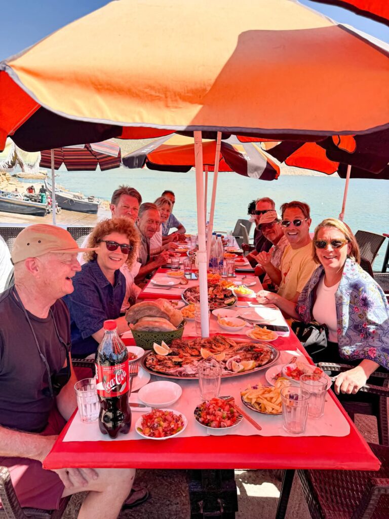 Group dinner with surf camp guests at a seaside restaurant